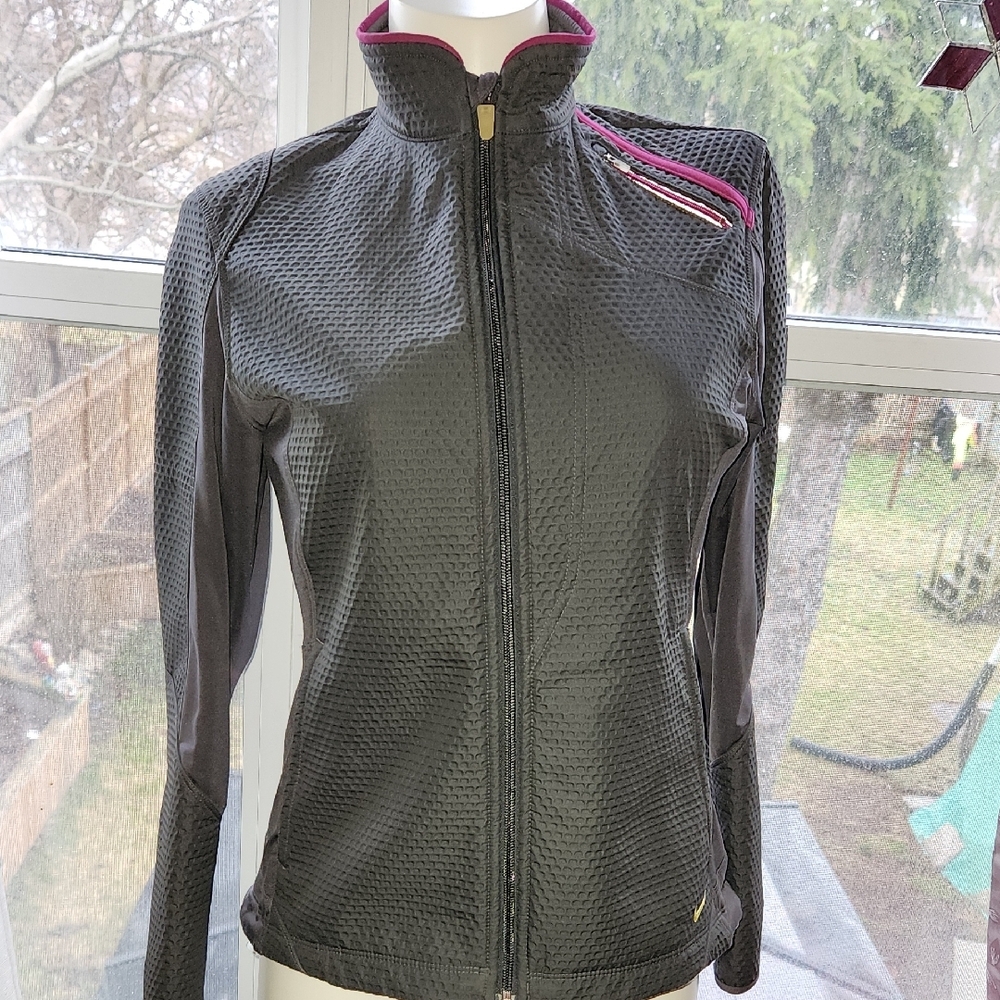 Nike Black and Pink SpringJacket with Streamlined Design